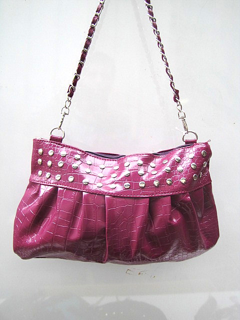 SAC TENDANCE CLOUTE REF 7005 2.95€ HT 