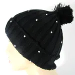 Bonnet pompom strass 1 €