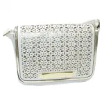 Sac à bandoulière avec motif perforé et noeud devant