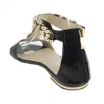 Sandales noires façon reptile vernis ornées de chaîne