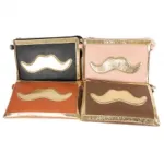 Sac à main motif moustache doré