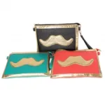 Sac à main motif moustache doré