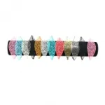 Bracelet ajustable en cordelette décoré d’un médaillon fantaisie