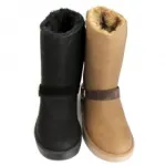 Bottes fourrées avec zip et bride bouclée devant