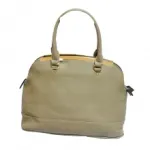 Sac à main de luxe bordé de métal doré